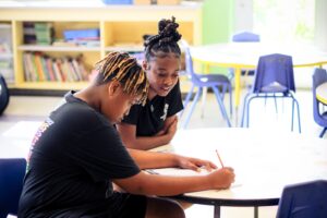 Staff helping with homework